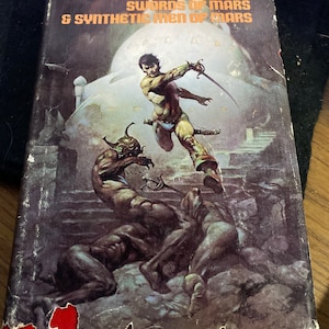 Swords of Mars and synthetic men of mars. Two stories one book. Edgar Rice Burroughs Frank Frazetta.