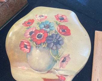 Vintage made in England hinged tin.  Poppy floral in vase design