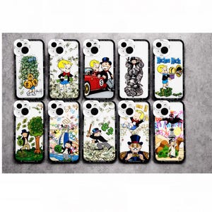 May include: A collection of ten phone cases featuring colorful cartoon illustrations. Each case showcases a different design with characters and themes related to wealth and money, including the text "Richie Rich".