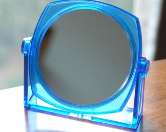 Espejo de tocador doble giratorio azul vintage, estilo posmoderno de color llamativo, decoración retro para el hogar, hecho en Hong Kong.