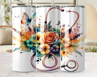 Könnte beinhalten: Drei Edelstahlbecher mit weißem Hintergrund und einem Blumendesign. Die Blumen sind in Orange-, Gelb-, Blau- und Lilatönen gehalten. Ein Stethoskop ist um die Blumen gewickelt.