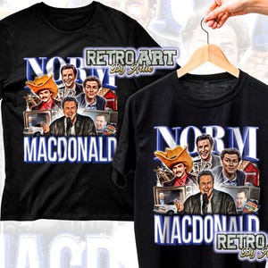 May include: Black t-shirts featuring a graphic of Norm Macdonald with the text "NORM MACDONALD" in white and blue. The design includes images of Macdonald in various poses, with a cowboy hat and a microphone.