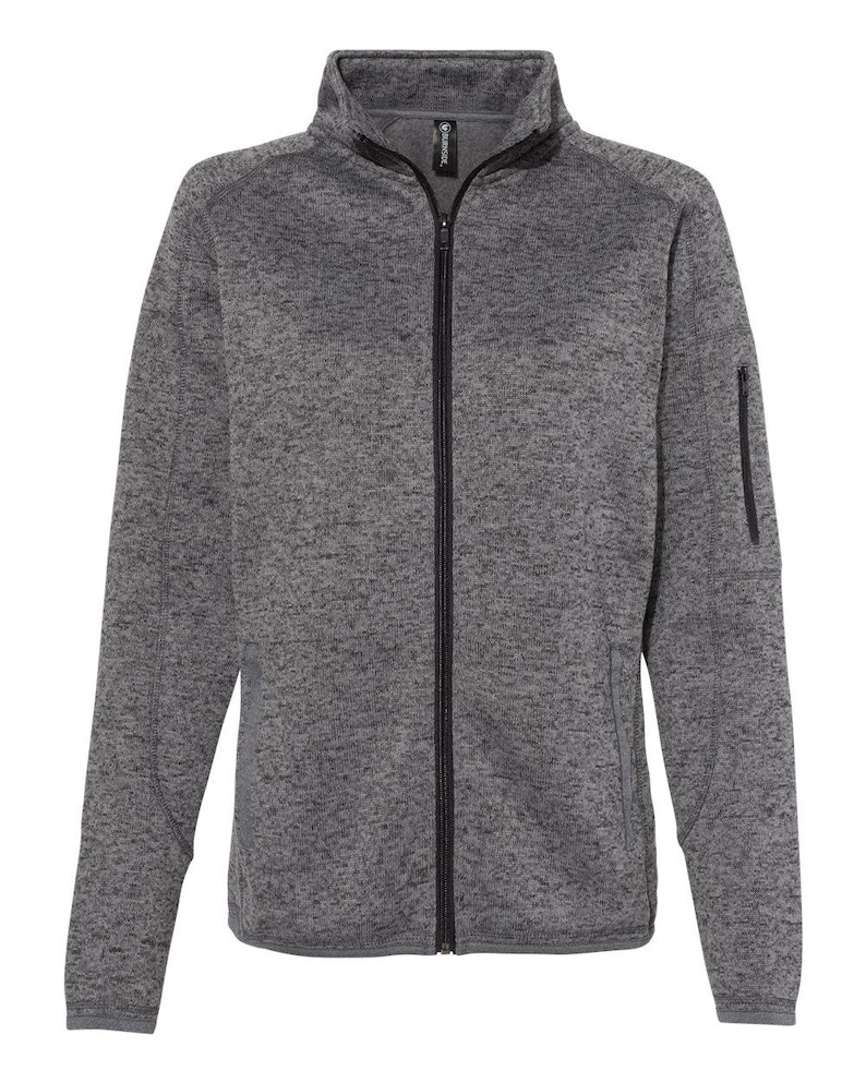 May include: A grey and black fleece zip-up jacket with a stand-up collar and a zipped pocket on the left sleeve.