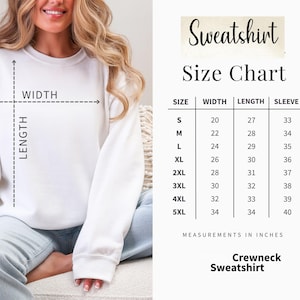 Pode incluir: Uma camisola branca de gola redonda com uma tabela de tamanhos. A tabela lista as medidas em polegadas para largura, comprimento e comprimento da manga, variando do tamanho pequeno ao 5XL. O texto "Sweatshirt" e "Size Chart" s&atilde;o exibidos.