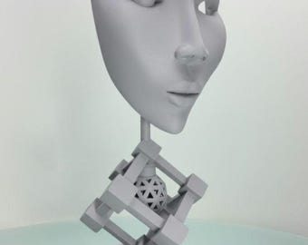 Escultura geométrica de rostro: Figura moderna abstracta de marfil