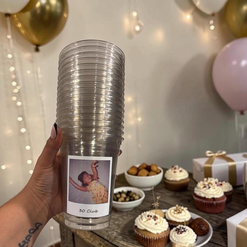 Make your celebration unforgettable with a custom photo cup personalized with your favorite picture. Perfect for 30th birthday party favor, personalized bday decorations, 21st gift idea, bachelorette party, or bride groom face cups. Create a hilarious funny gag gift for birthdays, bachelor and bachelorette parties, weddings, anniversaries, graduations, and more. A unique keepsake your guests will use, laugh about, and remember long after the party ends.