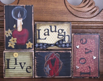 Live, Laugh Love Sign Word Blocks With Apple Candle