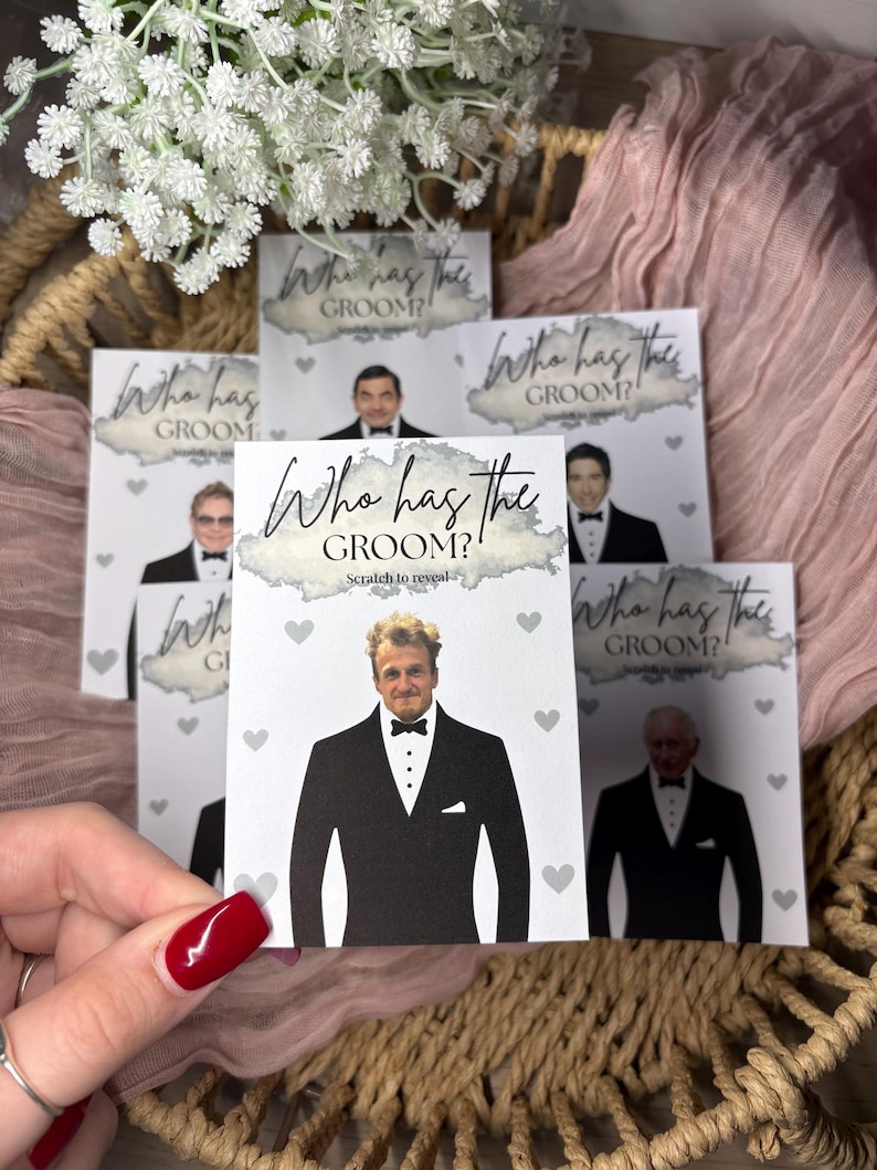 May include: A collection of rectangular game cards titled Who has the GROOM? with the text Scratch to reveal. Each card features a printed image of a man in a black tuxedo and bowtie, surrounded by small grey heart icons on a white background.