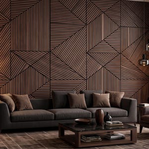 May include: A living room featuring a dark brown sofa and two matching armchairs arranged around a square wooden coffee table. The wall behind the furniture is covered in dark brown wood paneling with a geometric pattern of horizontal lines.