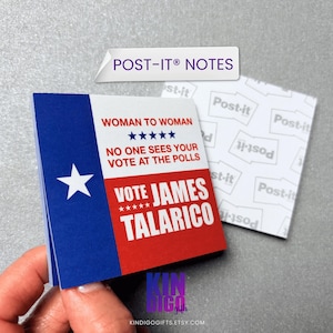 May include: A square notepad featuring a Texas flag design with a blue vertical stripe and a white star, alongside red and white horizontal stripes. The text reads: WOMAN TO WOMAN, NO ONE SEES YOUR VOTE AT THE POLLS, VOTE JAMES TALARICO.