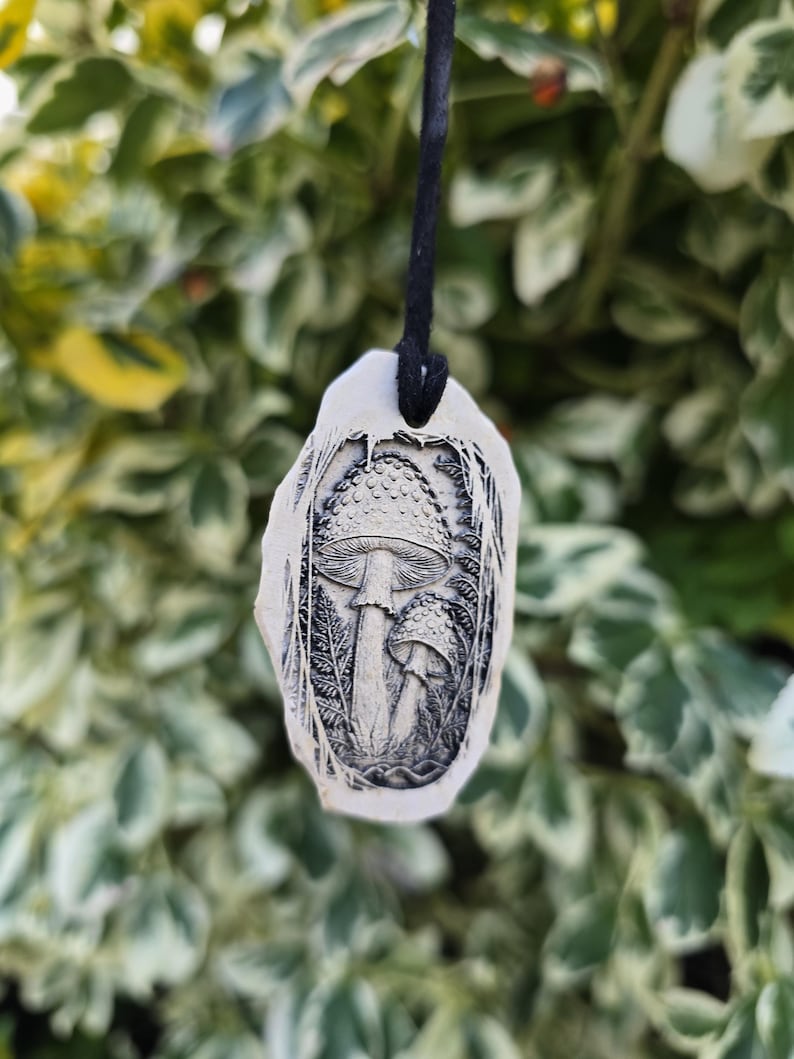 Amanita Muscaria / Muscimol – The Forest Trickster Double-Sided Shamanic Amulet • Amanita Molecule Engraving Mediterranean White
