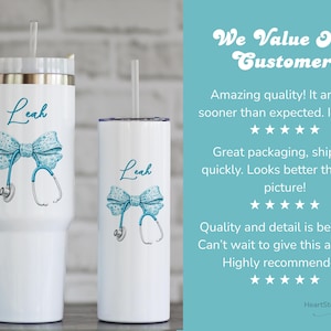 May include: White insulated tumbler and skinny tumbler with teal bow and stethoscope design. The name "Leah" is written in teal script. The tumblers have a straw and a handle. The image also includes customer reviews.