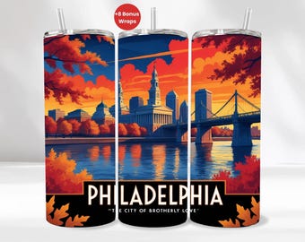 May include: A set of three stainless steel tumblers with a Philadelphia cityscape design. The design features a bridge, buildings, and a river under an orange and blue sky. The word "PHILADELPHIA" is displayed at the bottom.