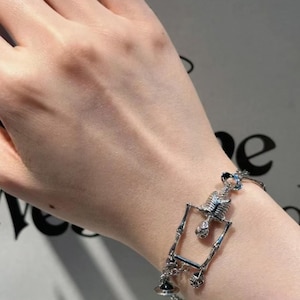Vivienne westwood skeleton bracelet - Etsy 日本