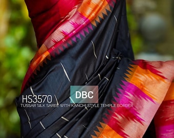 May include: Black Tussar silk saree with Kanchi style temple border. The saree has a vibrant border with pink, orange, and red hues. The design includes the text "HS3570" and "DBC".
