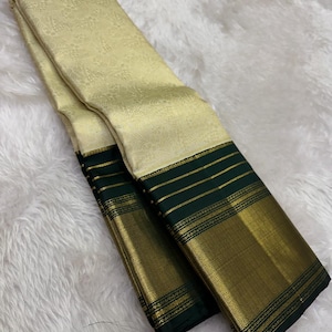 Mint and deep green combination Kanchipuram Silk Saree: Handloom Golden Zari, Silk Mark Certified