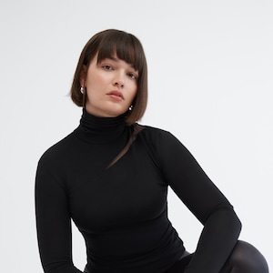 Fitted Mock Neck Top, Black Turtleneck Top, Cutout Long Sleeve Top, Mesh Accent Top, Fitted Long Sleeve Tee, Vee Top, Marcella - MB1899