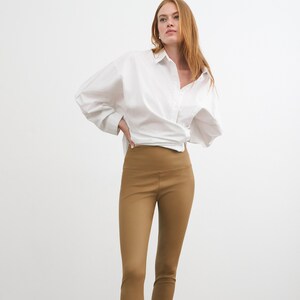 Beige leather leggings on sale