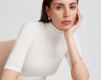 Off White Fitted Turtleneck, Half Sleeve Turtleneck with Sheer Panels, Fitted Short Sleeve Turtleneck Top, Niko Top, Marcella - MB2012