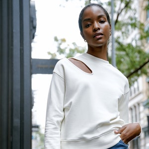 Front cut out sweatshirt best sale