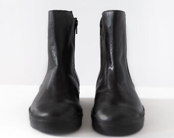 minimalist black boots