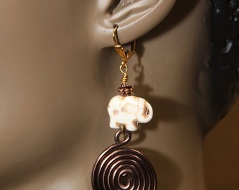 medium sz. brown spiral, howlite stone elephant, copper, dangles