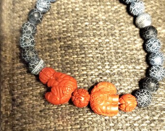 Stretch Bracelet with Cinnabar elephants and beads