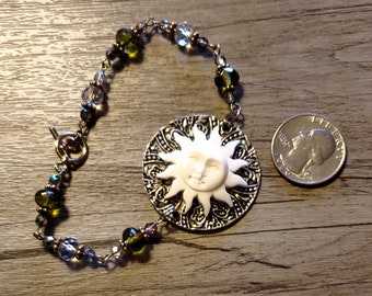 Beaded Bracelet Features Carved Sun