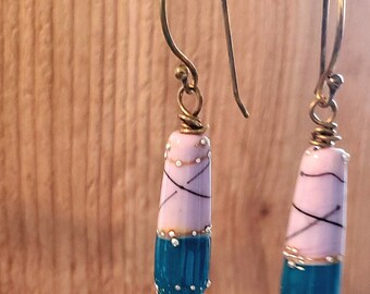 Pink, white and turquoise lampword beaded warnings with sterling silver drizzle.