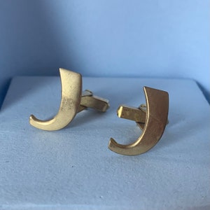 Hermosos gemelos vintage con la inicial de la letra J