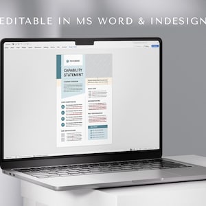 May include: A laptop displays a document titled "CAPABILITY STATEMENT" with a teal and gray design. The document includes sections for core competencies, image code, and past performances. The text "EDITABLE IN MS WORD & INDESIGN" is at the top.