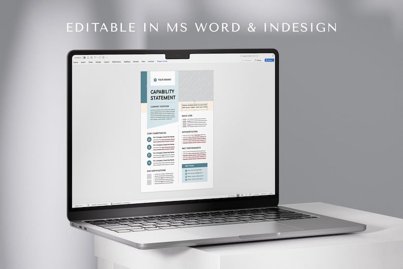 May include: A laptop displays a document titled "CAPABILITY STATEMENT" with a teal and gray design. The document includes sections for core competencies, image code, and past performances. The text "EDITABLE IN MS WORD & INDESIGN" is at the top.