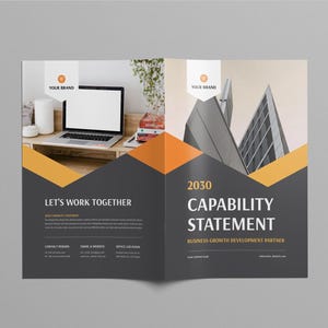 May include: A brochure spread with a modern design. The left side reads "Let's Work Together" with contact information. The right side says "2030 Capability Statement" with a building graphic and orange and black geometric shapes.