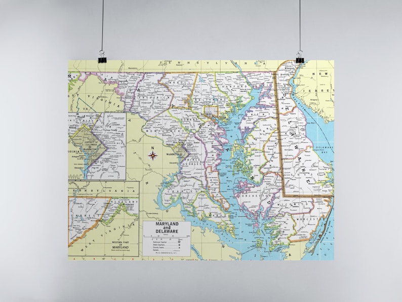 May include: A vintage map of Maryland and Delaware, showing the state borders, major cities, and counties. The map is printed on a light yellow background with blue and green accents.