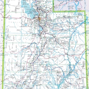 May include: A detailed map of the state of Utah, showing major cities, roads, and geographical features. The map is printed in blue, green, and black on a white background. The map includes the text "Salt Lake City", "Provo", "Moab", and "Glen Canyon National Recreation Area".