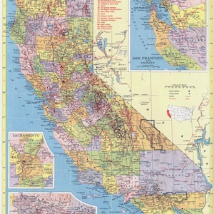 May include: A vintage map of California with a focus on the San Francisco and Los Angeles areas. The map is in shades of yellow, green, blue, and pink, with black lines indicating roads and cities. The map includes a scale of miles and a key for state capitals, county seats, and canals.