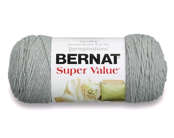 May include: A skein of Bernat Super Value yarn in a light gray color. The yarn is 100% acrylic and is 7 ounces (197 grams). The label also states that the yarn is approximately 328 yards (300 meters).