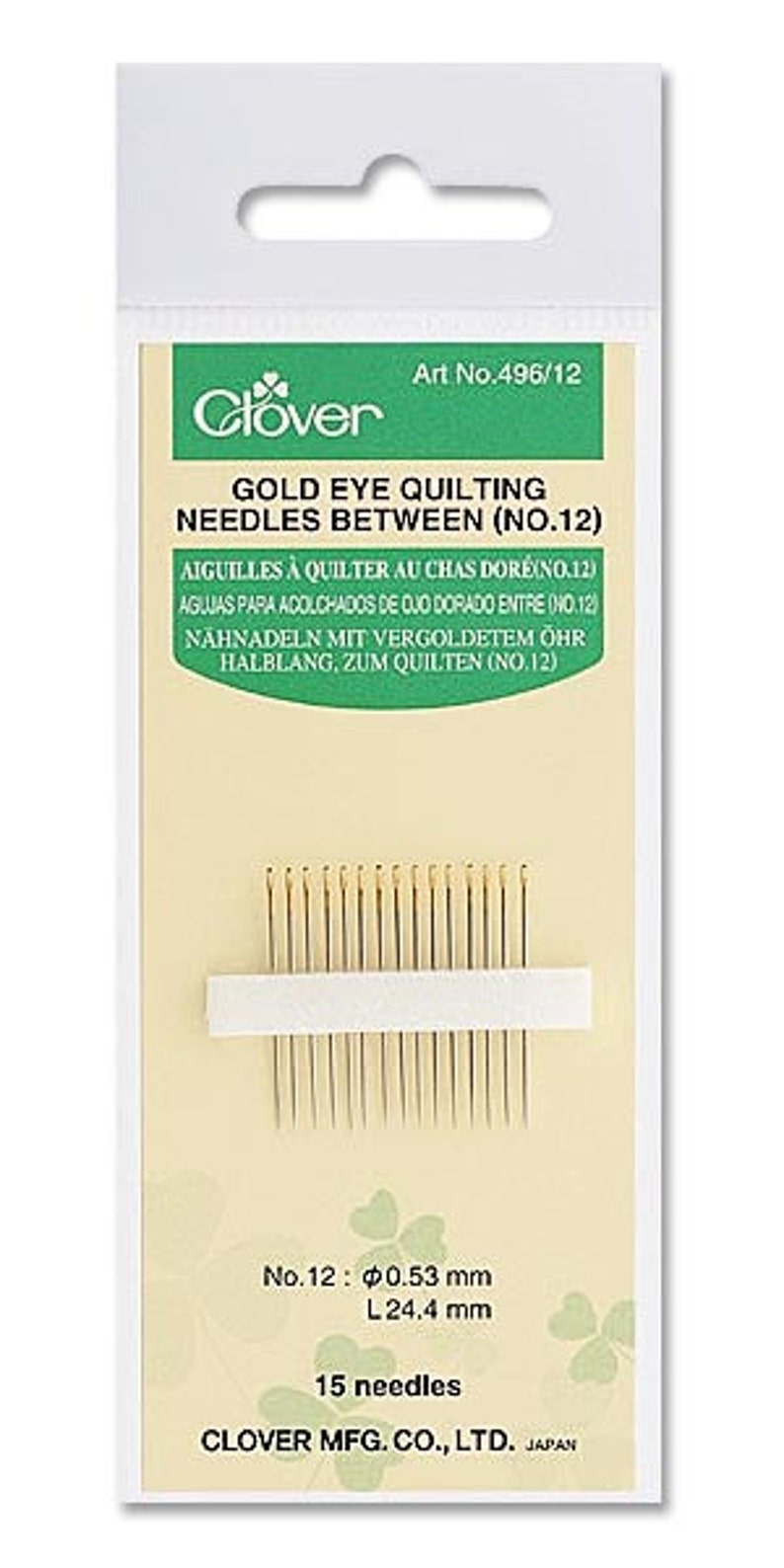 May include: A package of 15 gold eye quilting needles, size 12, with a green and white label that says "Clover Gold Eye Quilting Needles Between (No.12)". The label also includes text in French, Spanish, German, and Japanese. The needles are arranged in a row on a white backing.