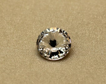 Celestial Crystal® rhinestone, crystal clear, foil back, 12mm faceted rivoli.