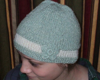 Hand knit hat or cloche in a pale green and off beige Wool and Silk blend