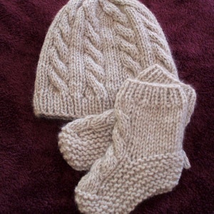 Hand knit Cashmere hat and booty set.
