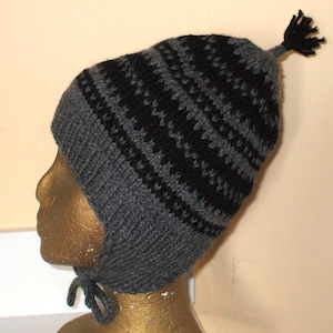 Warm winter earflap hat hand knit in black and grey 100 percent Wool