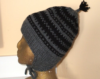 Warm winter earflap hat hand knit in black and grey 100 percent Wool