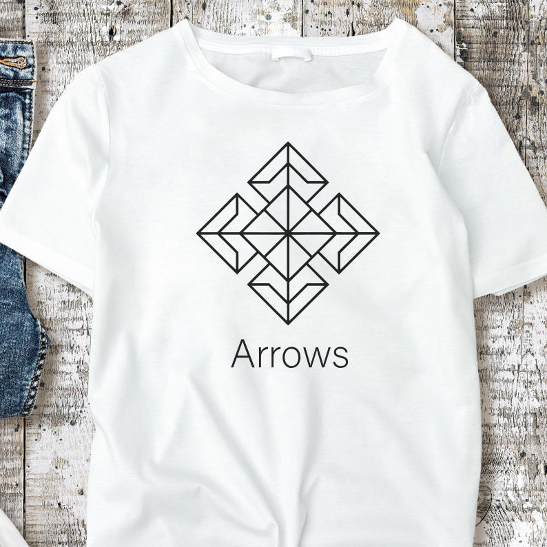 May include: White t-shirt featuring a black geometric arrow design. The design is a symmetrical arrangement of arrows forming a diamond shape, with the word "Arrows" printed below in a simple font. The shirt is made of a soft, light-colored fabric.