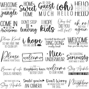 May include: A selection of black and white signs with different phrases. Some signs say "Welcome," "Home Sweet Home," and "Come In." Other signs include phrases like "I hope you like cats" and "Nice Underwear."