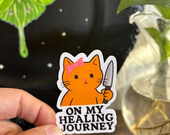 On My Healing Journey Sticker – Angry Cute Cat with Knife, Mental Health Humor, Vinyl Sticker, Self-Care with Sass