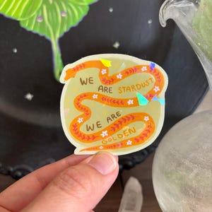 Holographic Snake Sticker: We Are Stardust, Golden Folk Art