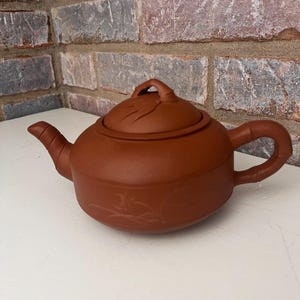 Yixing Purple Clay Teapot with Etched Flowers