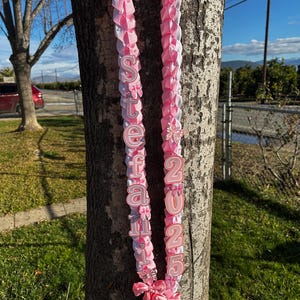 Coquette Grad lei