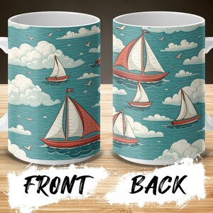 May include: White ceramic mug with a blue and white nautical design featuring sailboats and clouds. The front of the mug has a large sailboat with a red sail. The back of the mug has a smaller sailboat with a red sail.